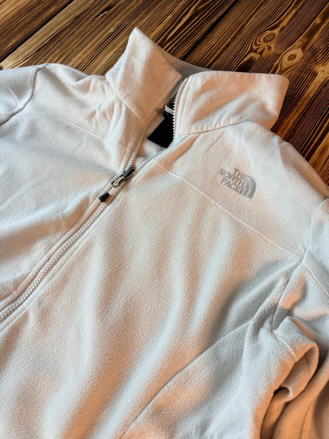 The North Face weiße Fleecejacke Logo