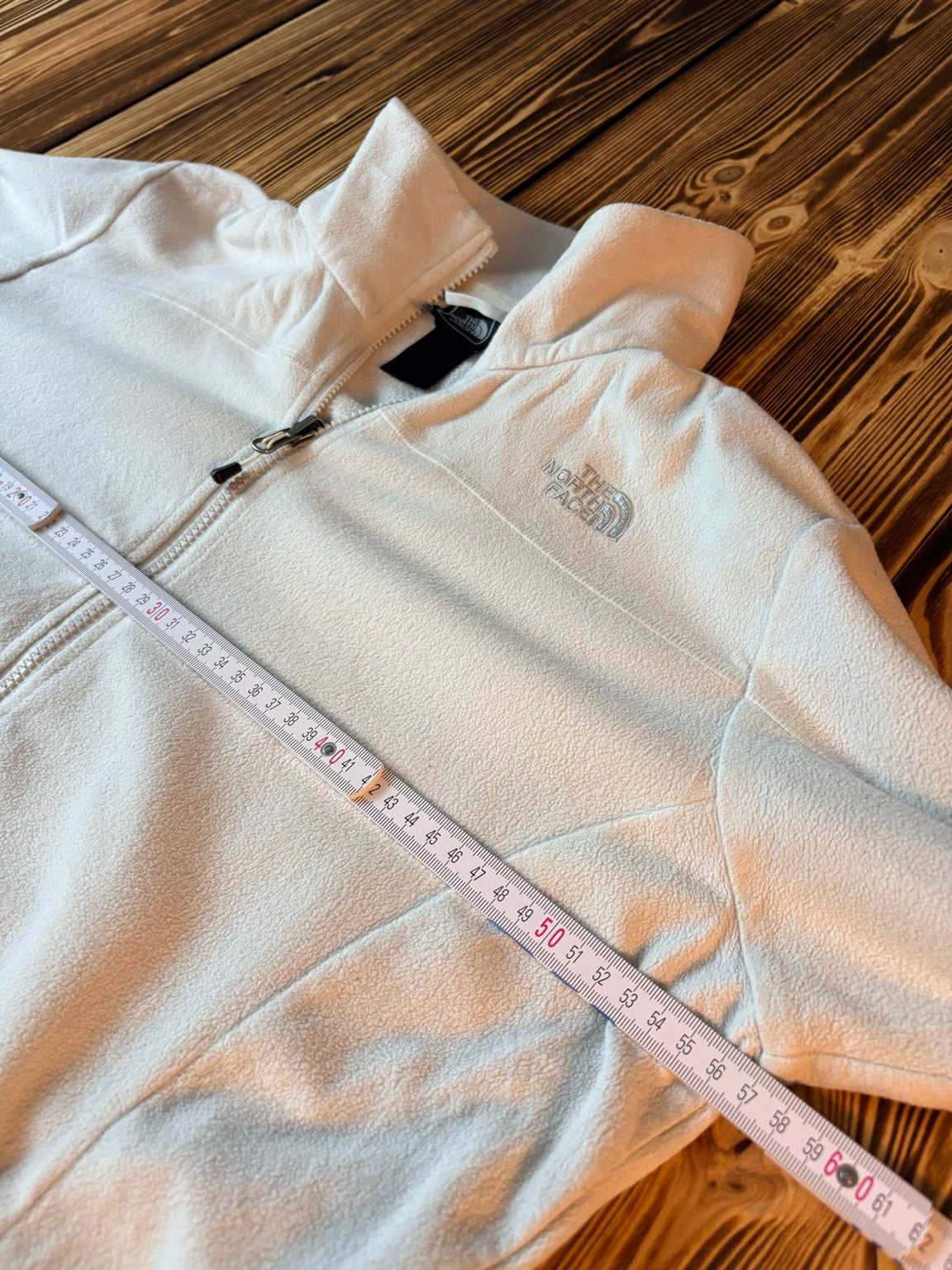 The North Face weiße Fleecejacke Maß